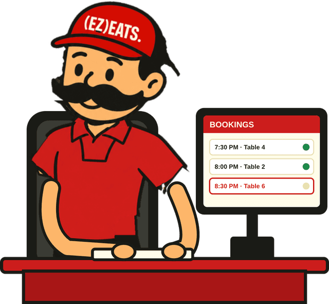 Abo Shanab at a desk taking bookings on a PC